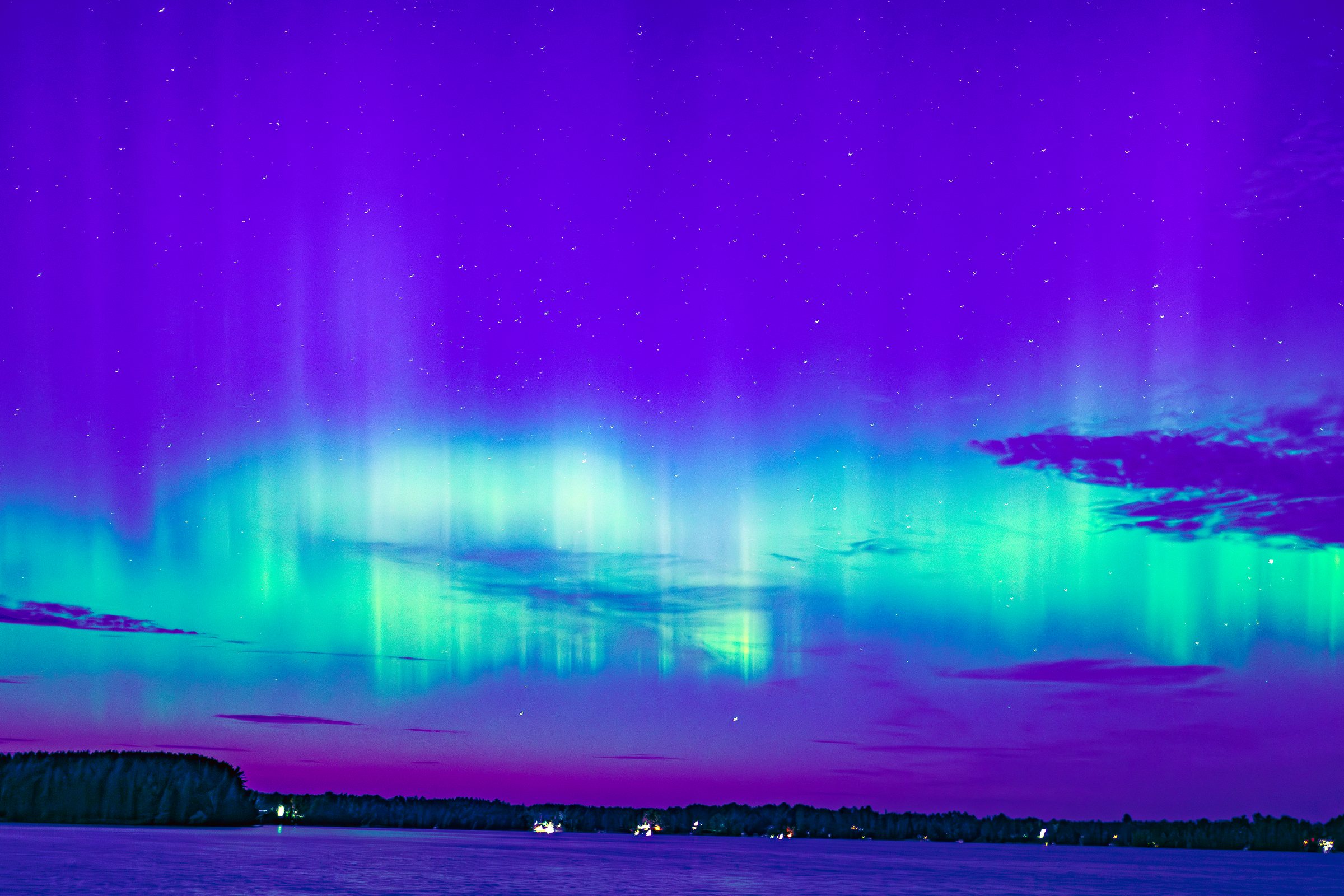Bands of aurora over a dark horizon